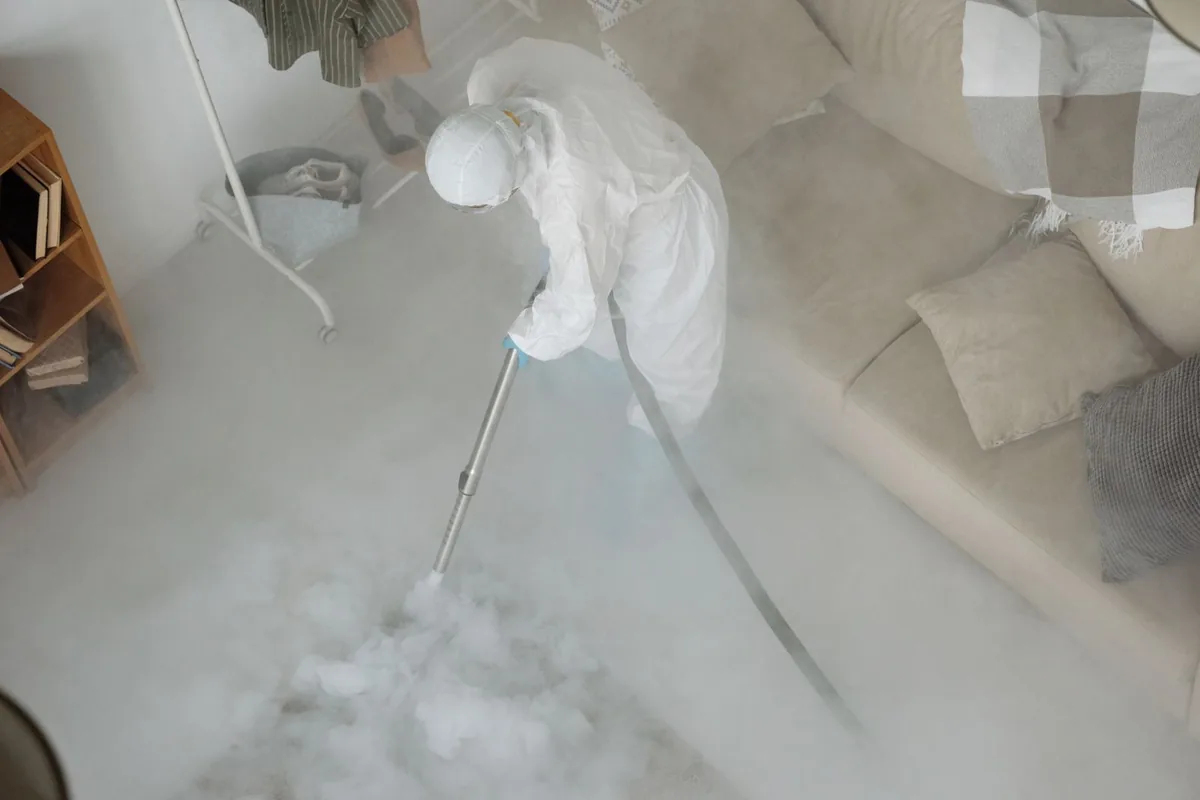 Biohazard cleanup technician in protective equipment, Cascades, VA